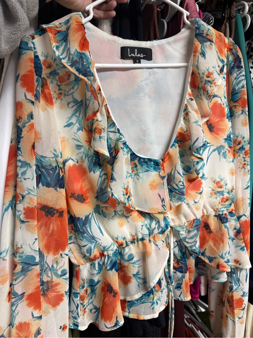 Lulu's Cream Floral Ruffle V-Neck Blouse with Orange & Teal Accents